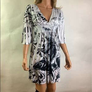 Retro style, fun hippy dress. White with Black butterfly, flared sleeve